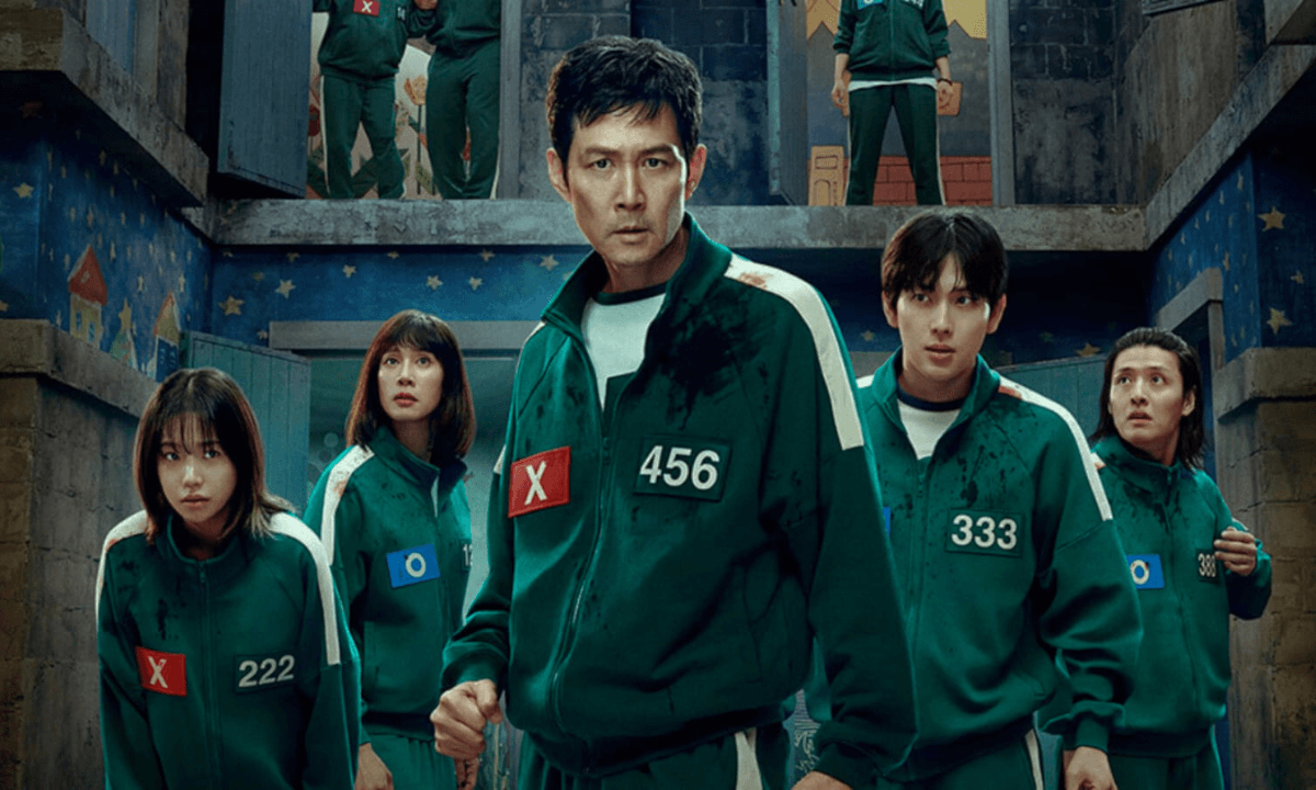 Squid Game Season 3 Release Date: Squid Game Season 3 poster featuring main characters with dark and intense background, showcasing the deadly survival game theme