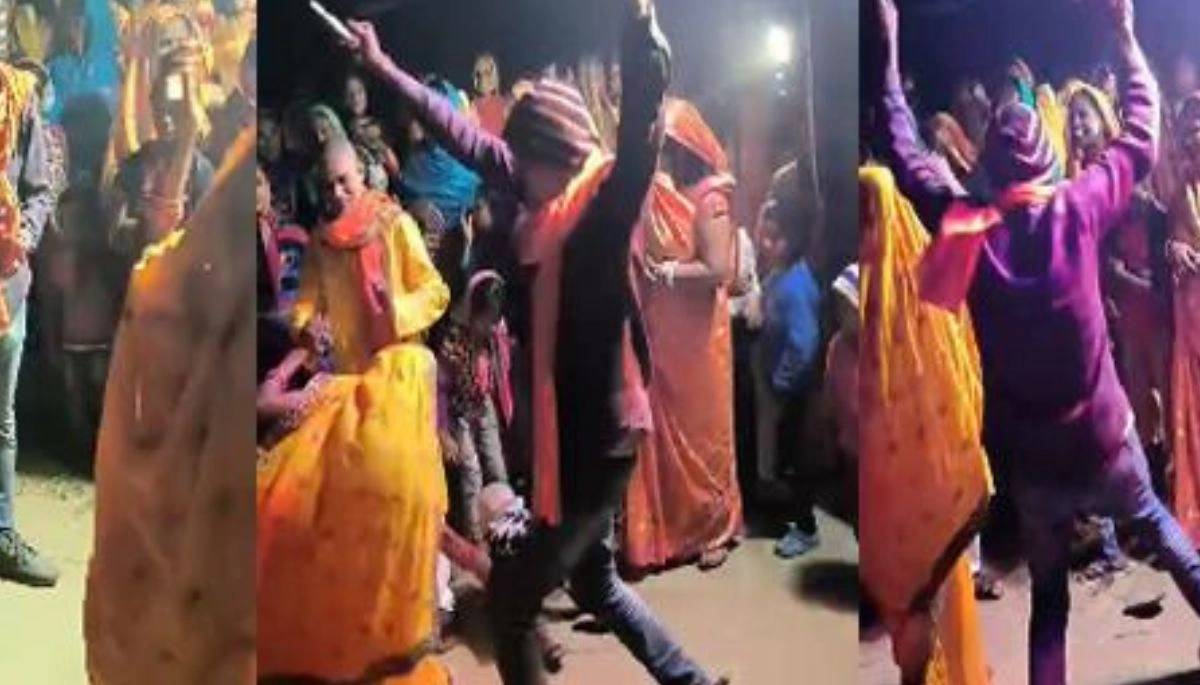 A young man dancing at a wedding ceremony while holding a firearm in his hand. The video has gone viral on social media.
