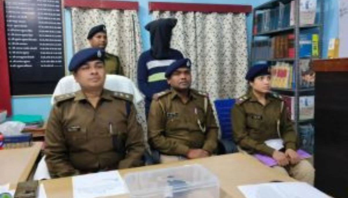 Police seize a country-made gun during a raid at the house of Kapildev Yadav in Aurangabad.