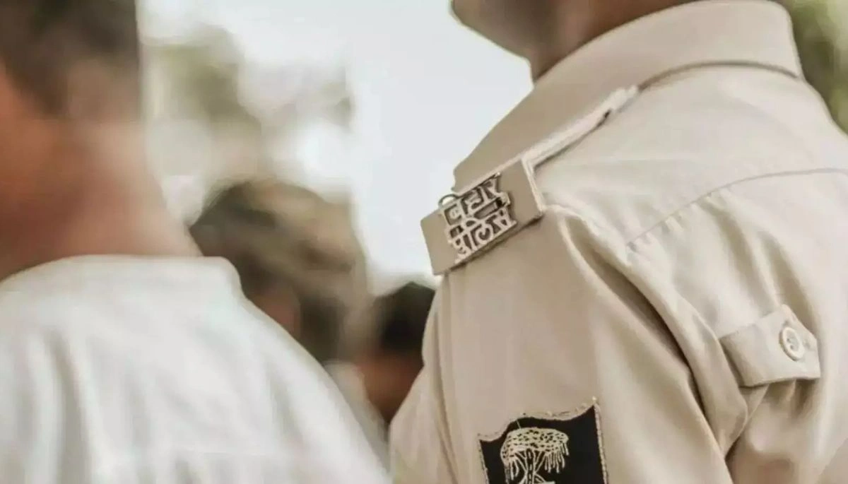 A Bihar Police officer assisting citizens during an emergency, showcasing prompt response and community support.