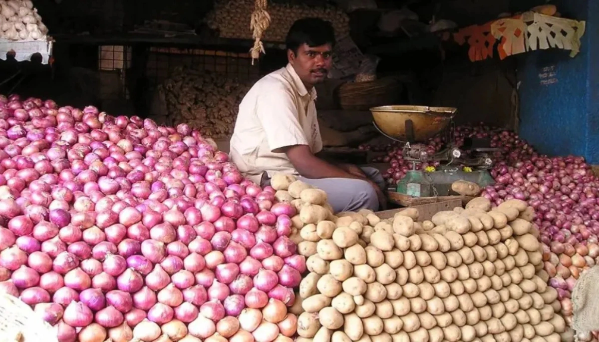 Trucks stuck at the Bengal-Bihar border due to a supply blockade, leading to concerns about rising prices of onions and potatoes.